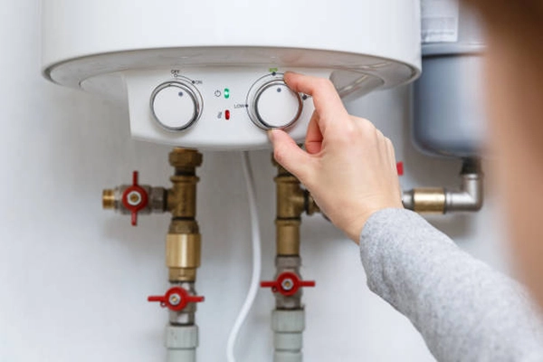 set the temperature of a hot water system